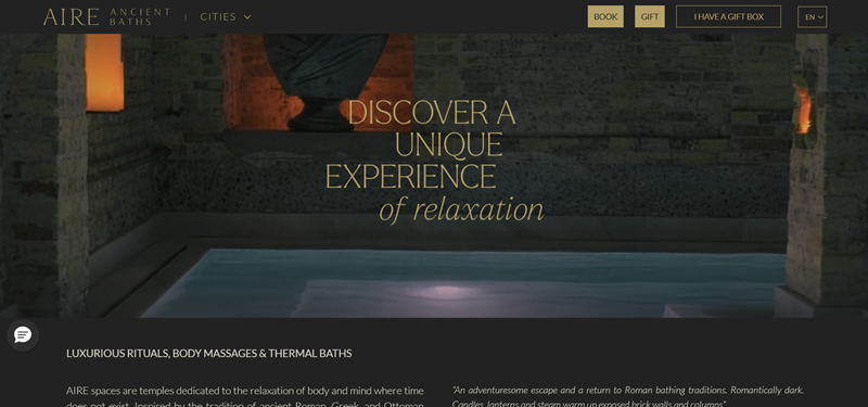 Mẫu website spa đẹp AIRE Ancient Baths phong cách tối sang trọng